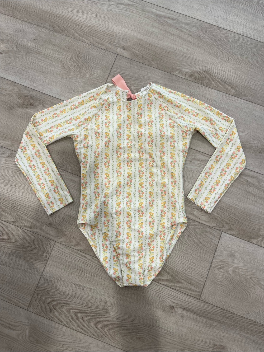 Minnow women's linear citrus rashguard one piece, size Small
